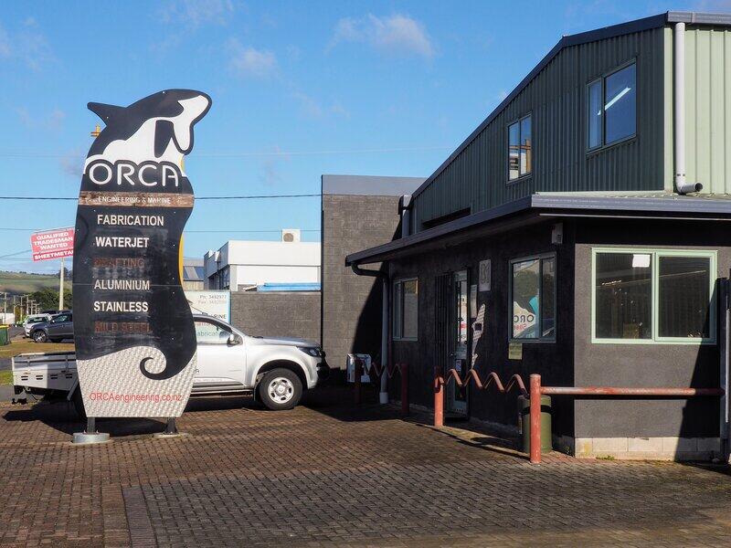 The ORCA Engineering and Marine team standing together in our workshop